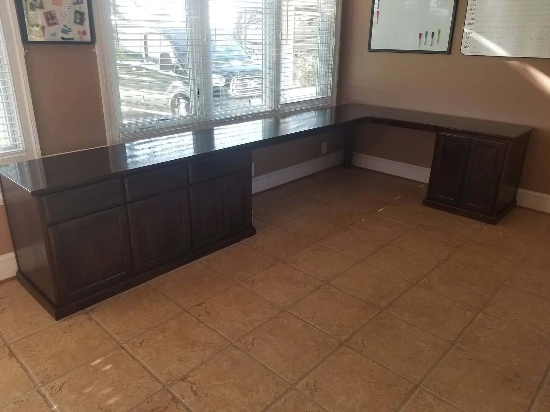 Large dark-stained custom executive desk