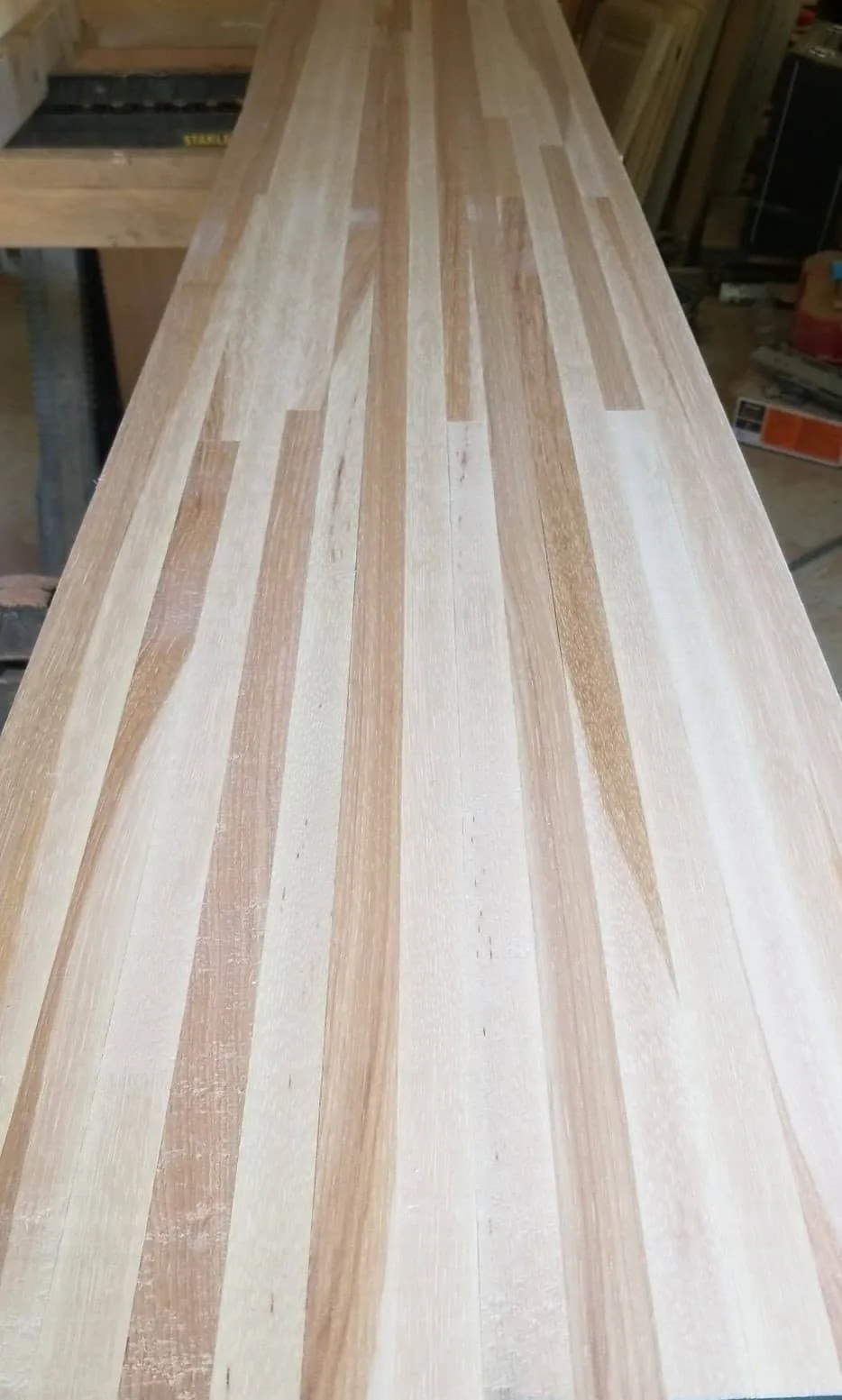 Laminated hickory wood slab in the workshop